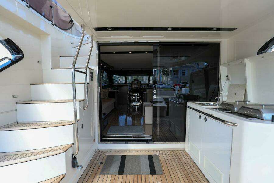 2016 Marquis 660 Sport Yacht interior with modern design and luxurious amenities.