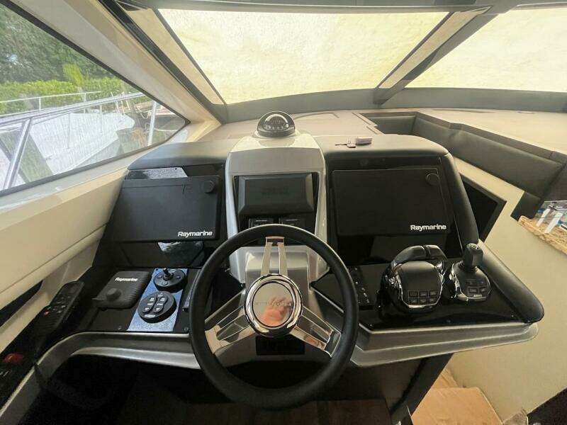 Helm of 2017 Marquis 500 Sport Yacht with Raymarine electronics.