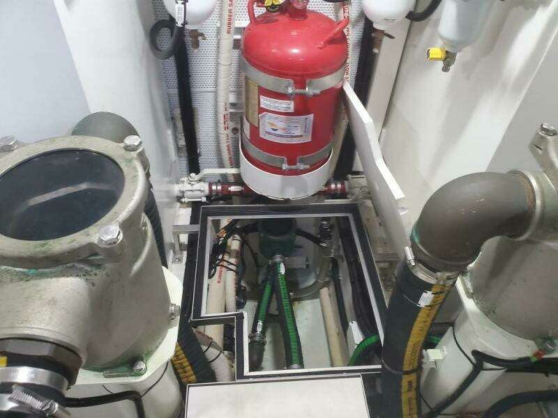Engine room of a 2020 Galeon 500 Fly yacht with fire extinguisher.