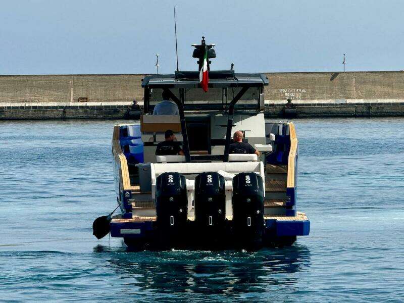 Aicon Audace 50 yacht, 2025 model, cruising in a harbor.