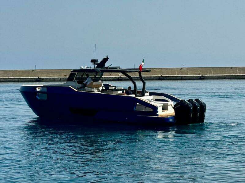 2025 Aicon Audace 50 yacht on calm water, featuring sleek design and powerful engines.
