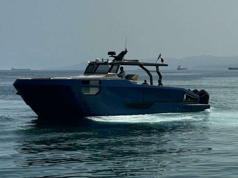2025 Aicon Audace 50 yacht cruising on calm waters, side view.