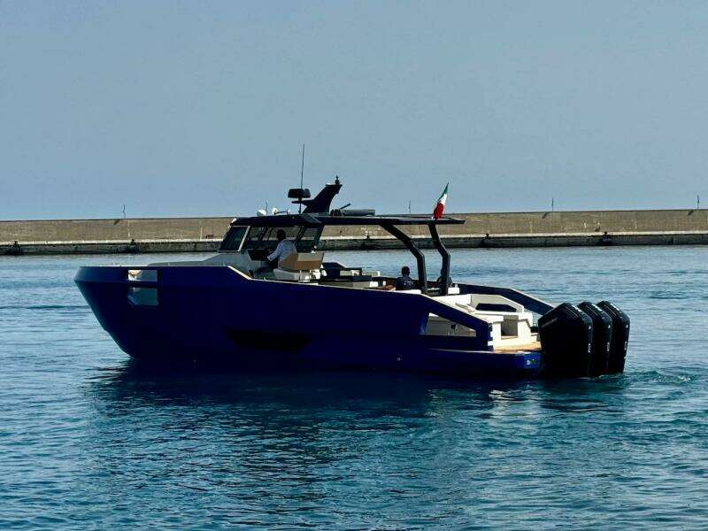 Aicon Audace 50 yacht, 2025 model, cruising in a calm harbor.