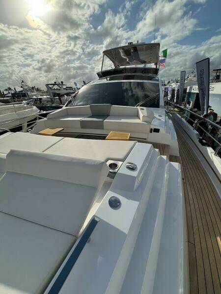 2024 Aicon 66 Vivere luxury yacht with sleek design and spacious deck.