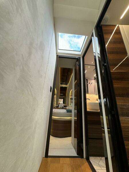 Interior view of 2024 Aicon 66 Vivere yacht with skylight and modern design.