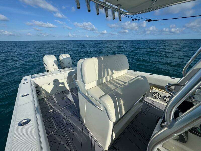 2017 SeaVee 340Z boat on open ocean, featuring dual engines and spacious seating.