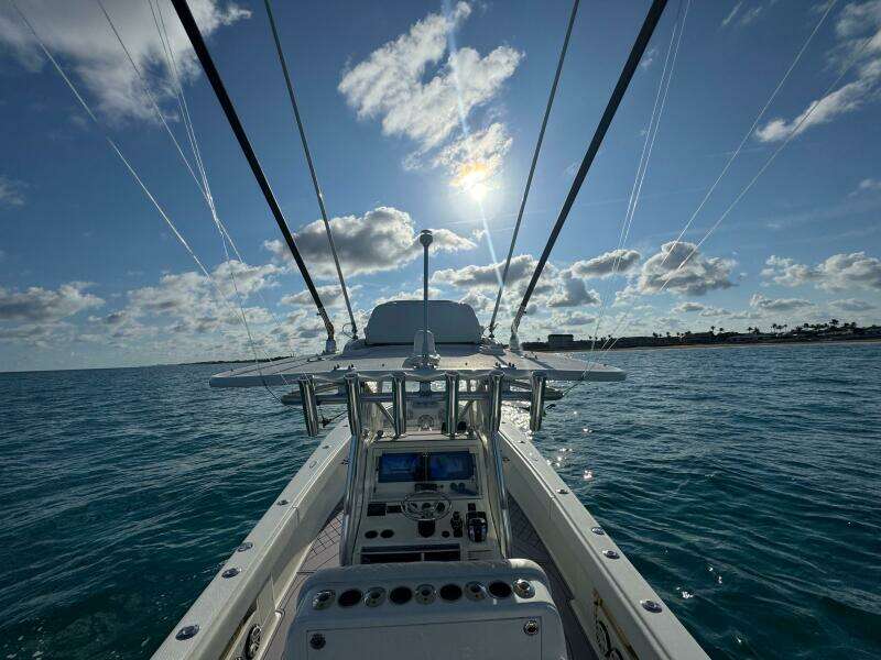 2017 SeaVee 340Z boat on open water under a bright, sunny sky.