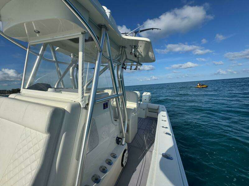 2017 SeaVee 340Z boat on open ocean under clear blue sky.
