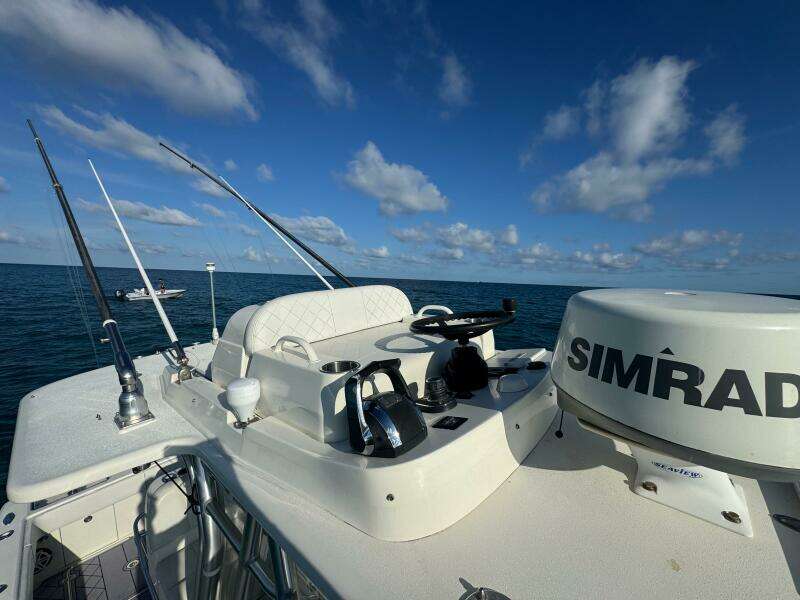 2017 SeaVee 340Z boat with Simrad equipment on open water under blue sky.