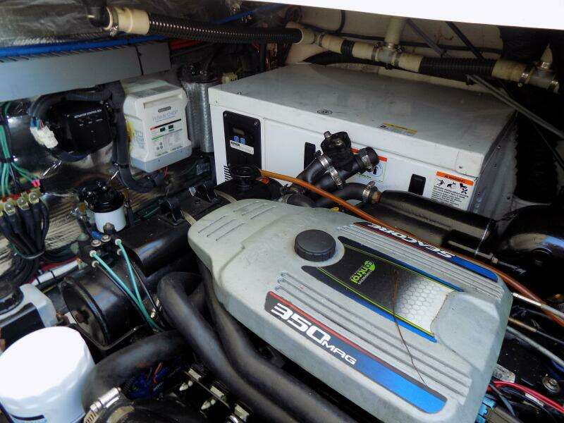 Starboard engine adjacent to genset