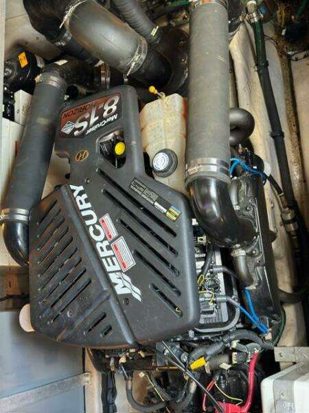 Engine compartment of a 2003 Sea Ray 380 Sundancer with Mercury 5.8 inboard motor.