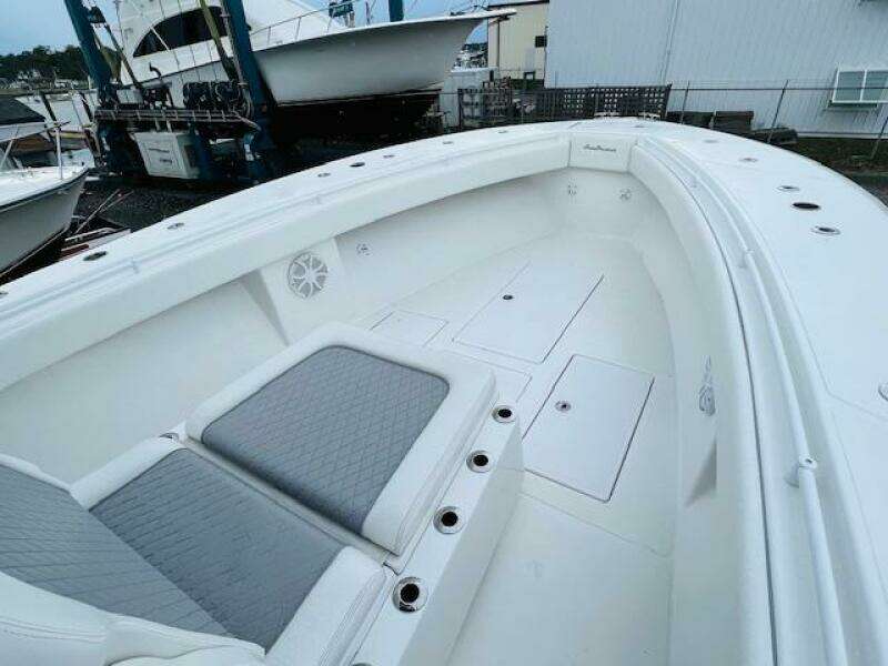 2020 SeaHunter 39 Tournament boat interior with cushioned seating and storage compartments.
