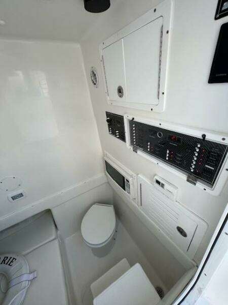 2020 SeaHunter 39 Tournament boat interior with control panels and seating area.