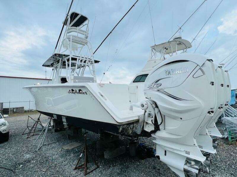 2020 SeaHunter 39 Tournament boat with Yamaha engines, displayed on stands outdoors.