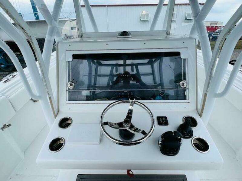 2020 SeaHunter 39 Tournament boat console with steering wheel and controls.