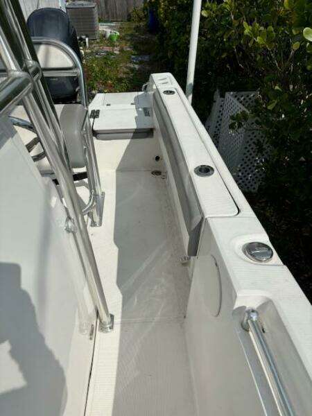 2016 Release 208 RX boat interior with seating and rod holders.