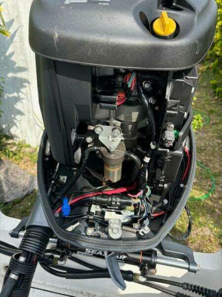 2016 Release 208 RX engine with visible wiring and components.