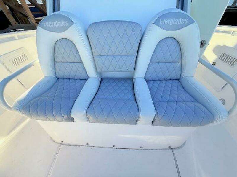 2014 Everglades 355 Center Console boat seating with quilted upholstery.
