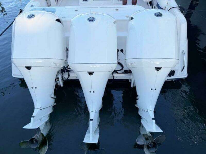 Triple outboard engines on a 2014 Everglades 355 Center Console boat.