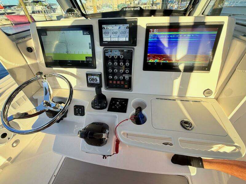 2014 Everglades 355 Center Console dashboard with navigation screens and controls.