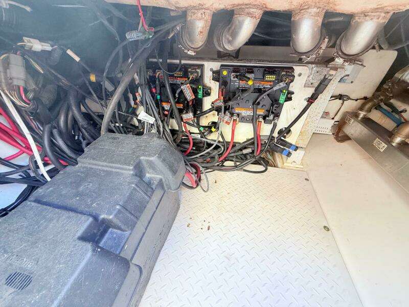 Electrical wiring and components inside a 2014 Everglades 355 Center Console boat.