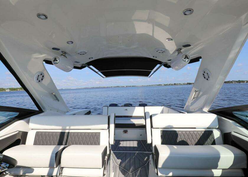 2023 Monterey 385 Super Sport boat interior with luxurious seating and lake view.