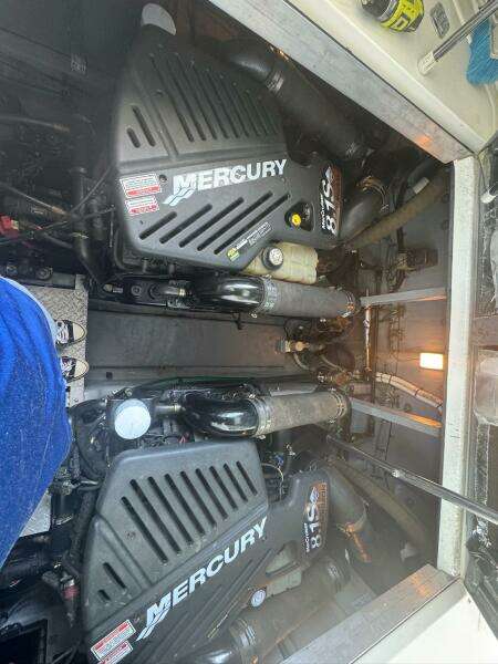 Engine room of a 2001 Sea Ray 380 Sundancer with twin Mercury engines.