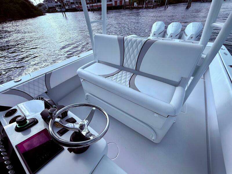 2024 Contender 39 ST boat interior with sleek seating and modern controls.