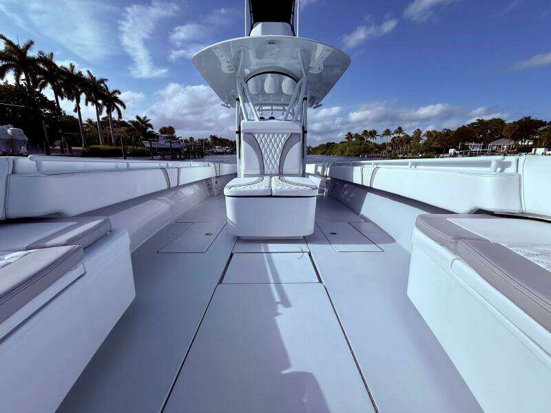 2024 Contender 39 ST boat interior with sleek seating and open deck design.