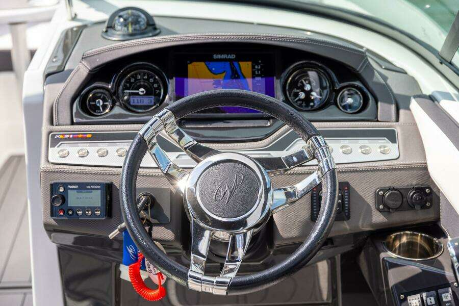 2023 Monterey 255 Super Sport dashboard with steering wheel and navigation display.