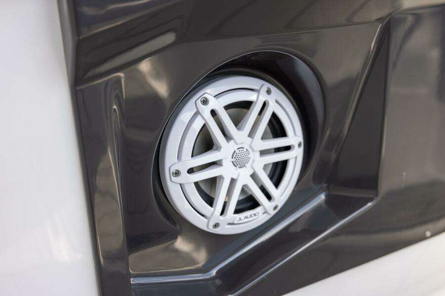 Speaker detail on 2023 Monterey 255 Super Sport boat, featuring sleek design and modern audio system.