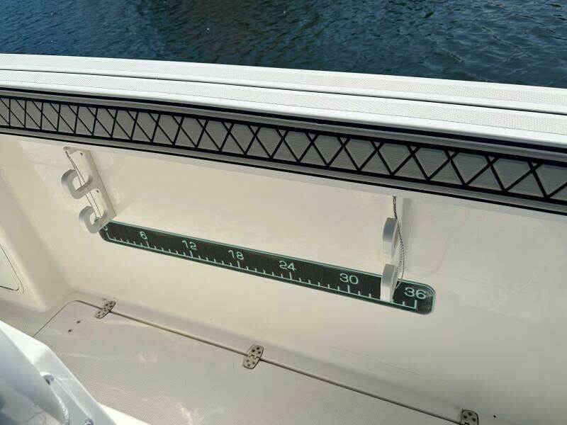 2019 Wellcraft 262 Fisherman boat interior with built-in measuring ruler.