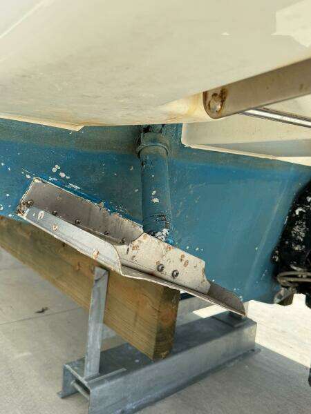 2014 Sea Ray 270 SLX boat hull on a stand, showcasing trim tab details.