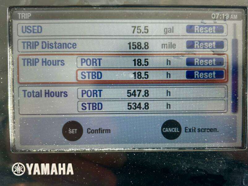 Yamaha boat display showing trip data: 75.5 gallons used, 158.8 miles traveled, 18.5 hours port/starboard.