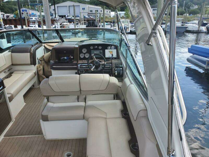 2015 Formula 330 Crossover Bowrider interior with luxurious seating and modern dashboard.