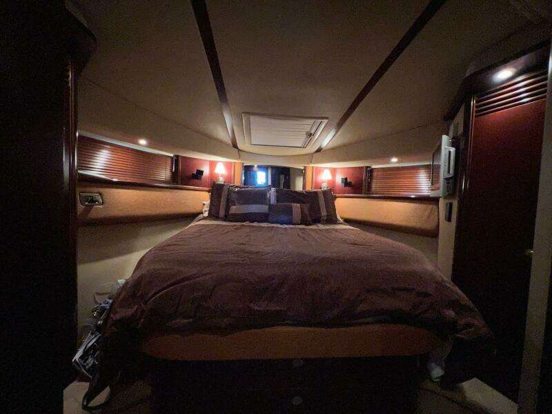 Luxurious bedroom interior of 2005 Sea Ray 500 Sedan Bridge yacht.