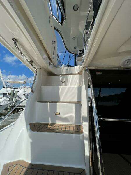Staircase on 2005 Sea Ray 500 Sedan Bridge yacht, leading to upper deck.
