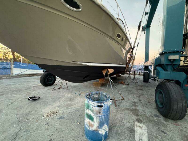 2005 Sea Ray 500 Sedan Bridge yacht in dry dock for maintenance.