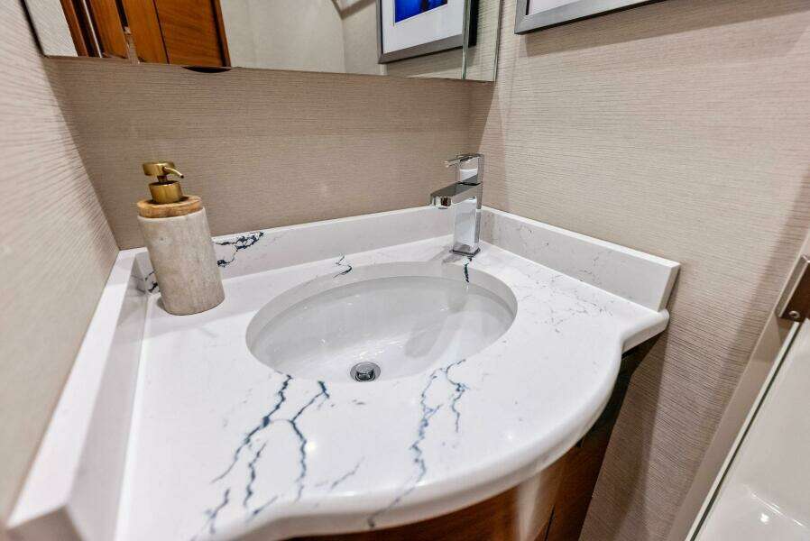 2023 Viking 64 Convertible- SIN PELO- Port Stateroom(s) Head