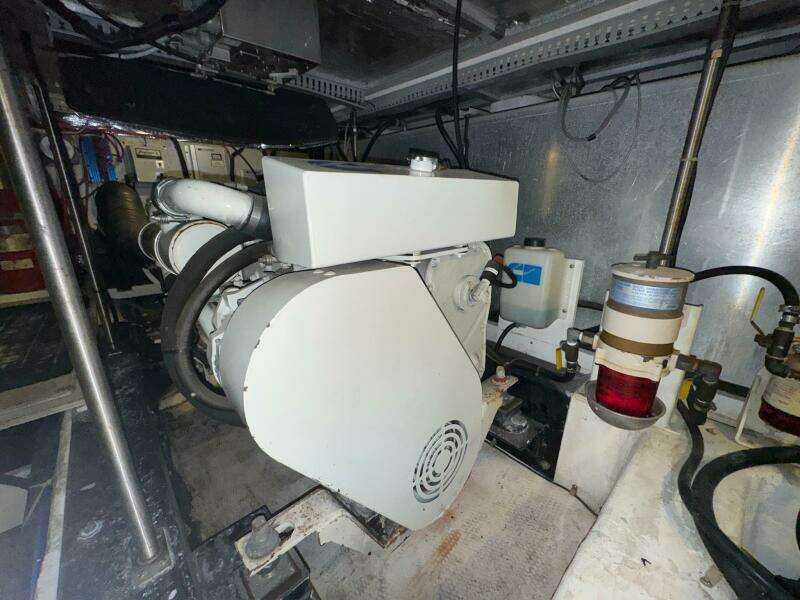 Engine room of 2000 Carver 506 Motor Yacht, showcasing machinery and components.