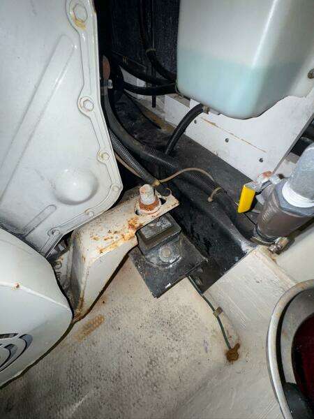 Engine compartment of a 2000 Carver 506 Motor Yacht, showing mechanical components and wiring.