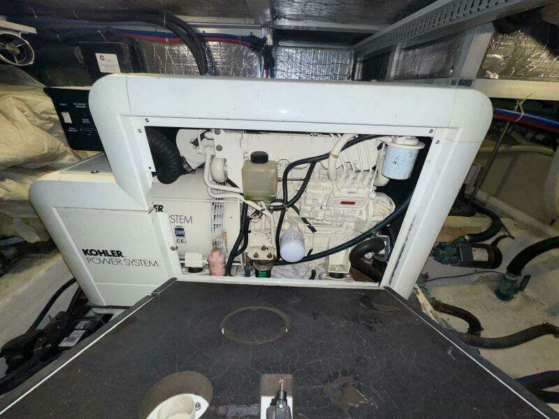 Engine room of 2000 Carver 506 Motor Yacht with Kohler power system.