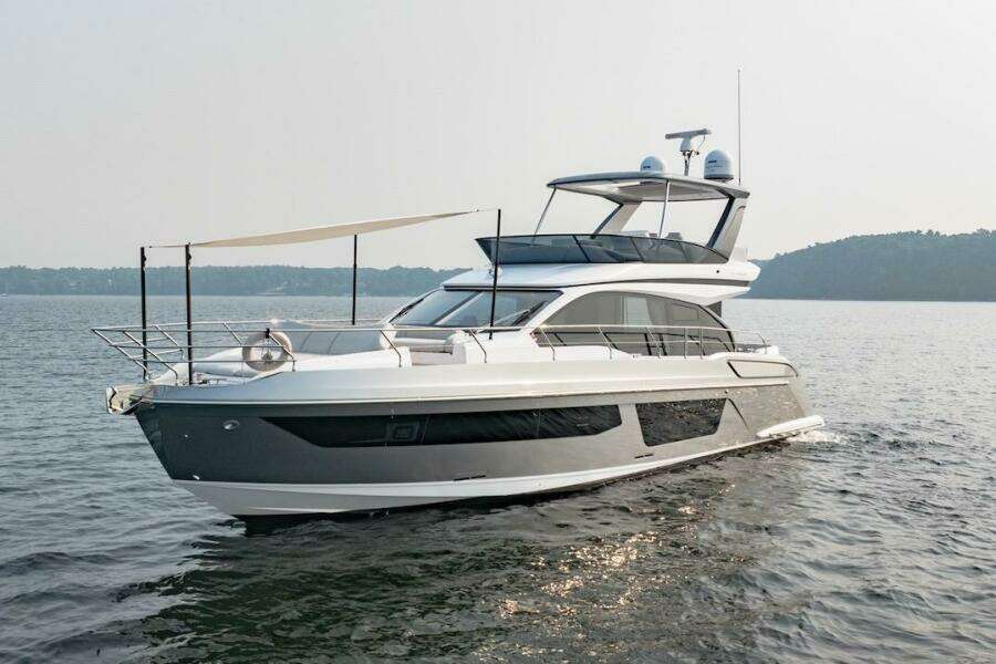 2023 Azimut Fly 53 yacht cruising on calm waters.