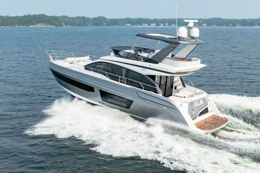 2023 Azimut Fly 53 yacht cruising on open water, showcasing sleek design and luxury features.