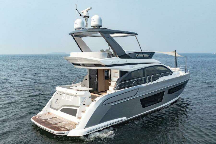 2023 Azimut Fly 53 yacht cruising on open water, showcasing sleek design and luxury features.