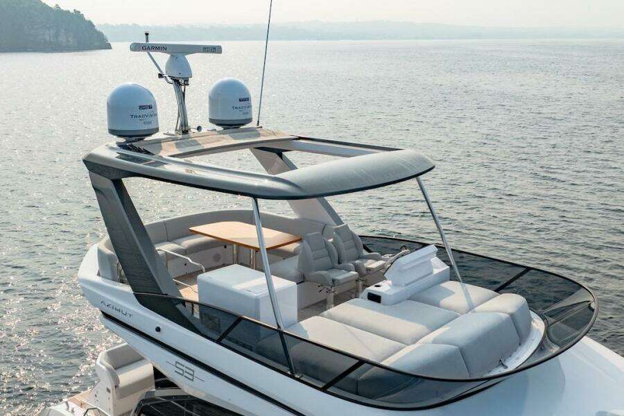 2023 Azimut Fly 53 yacht with sleek design and luxurious seating on open water.