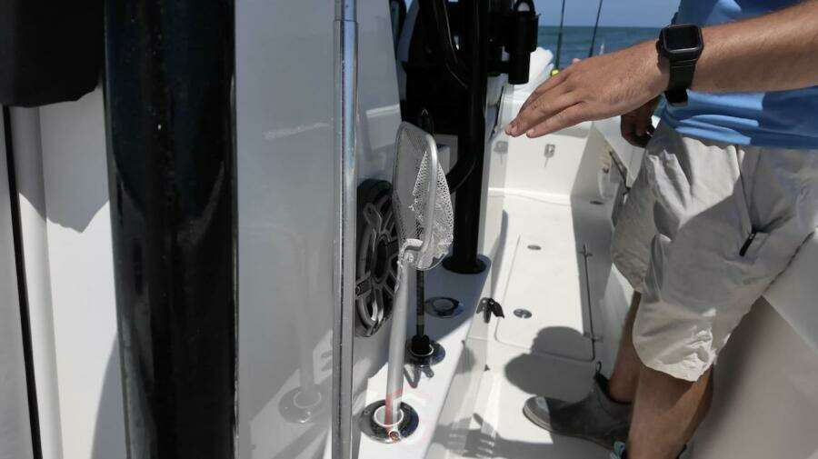 2023 CG Boat Works 35 M-Series deck with fishing gear and person onboard.