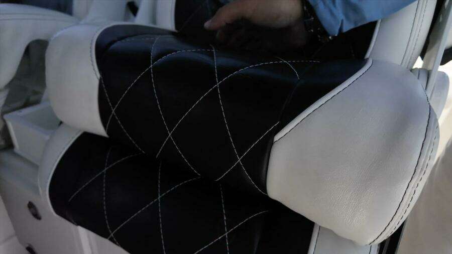 Luxurious black and white leather seating on 2023 CG Boat Works 35 M-Series.