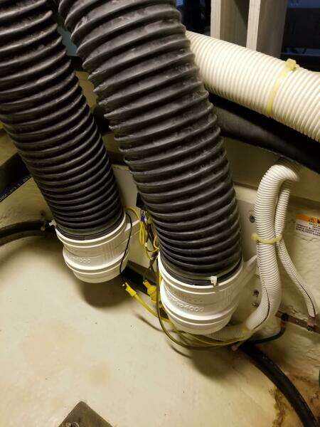 Engine room hoses in a 2004 Carver 360 Sport Sedan boat.