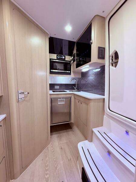 2024 Scout 400 LXF interior kitchen with modern appliances and sleek design.